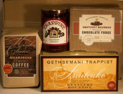 Fruitcake (20oz), Chocolat Bourbon Fudge w/Pecans(12oz), Nicaraguan Coffee(12oz), & Strawberry Prese